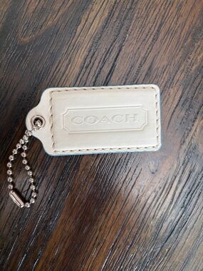 COACH Cream Leather Key Tag with light blue trim Embossed Logo